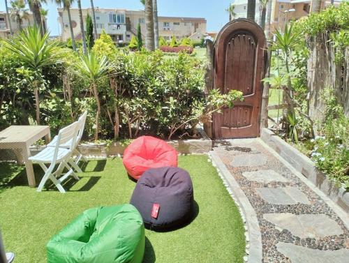 شقه بمجموعة بغداد بالمعموره بالدور الأرضي