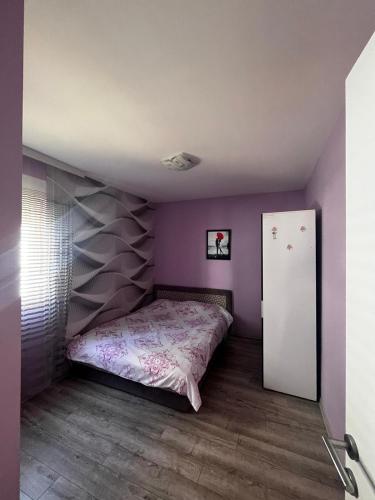 Postel nebo postele na pokoji v ubytování Jovana Apartman Vrnjacka Banja