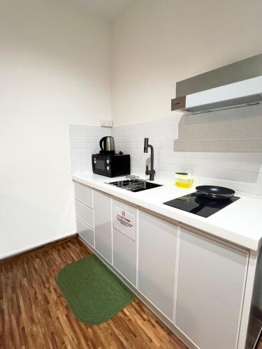 Gallery image of K Avenue DELUXE STUDIO 4-5PAX 5MIN TO KKIA in Donggongon