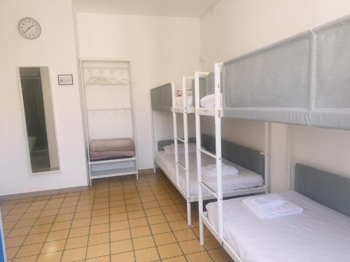 Postel nebo postele na pokoji v ubytování Lisa HOUSE