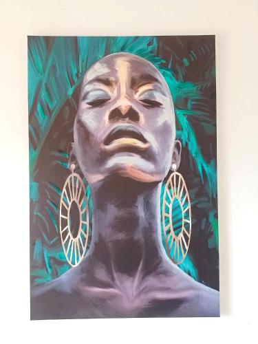 a painting of a mans face with earrings at 4star Room 'Kata' - with private bathroom and free air-conditioned summer kitchen in Šarića Struga
