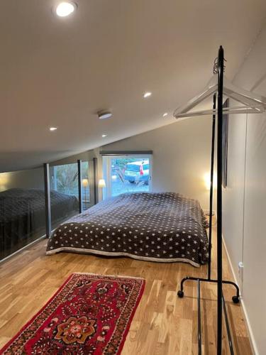 Ένα ή περισσότερα κρεβάτια σε δωμάτιο στο AC och nära sjö, fri parkering och städ,Wifi 100 mbit