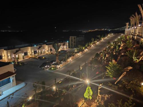 an aerial view of a street at night at Sea Gate Resort in Sowayma