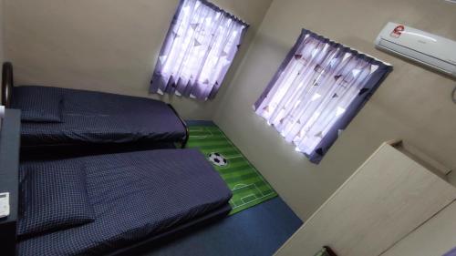 Schemumarc Roomstayにあるベッド