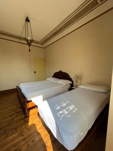 Ένα ή περισσότερα κρεβάτια σε δωμάτιο στο Casa Vacanze Pirulla