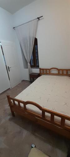 Postel nebo postele na pokoji v ubytování Chorion Apartment