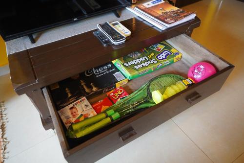 a drawer filled with different types of food at Hidden Haven - The Goan Getaway in Dhamni