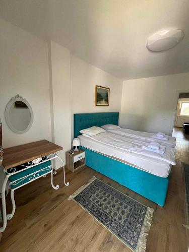 Кровать или кровати в номере Apartmani MAJ