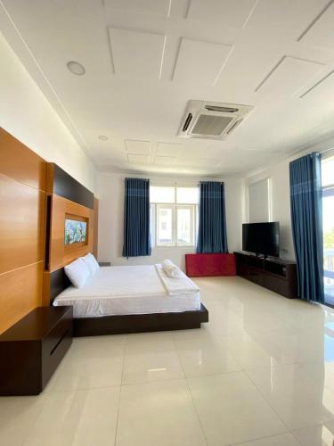 Postel nebo postele na pokoji v ubytování Villa Phan Thiết Gần Biển