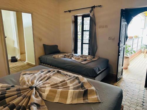 Postel nebo postele na pokoji v ubytování Riad Salma Restaurant Spa