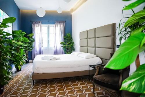 Cama o camas de una habitación en Valhalla Boutique Hotel
