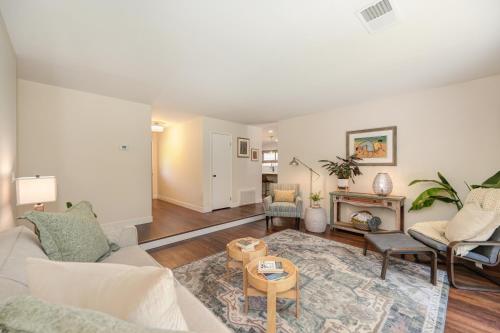 a living room with a couch and a fireplace at Family-Friendly Getaway Near Slide Hill Park home in Davis