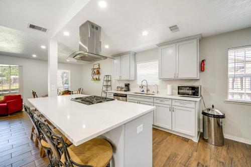 a kitchen with white cabinets and a white counter top at Texas Home with Yard 2 Mi to Prairie Creek Park in Richardson