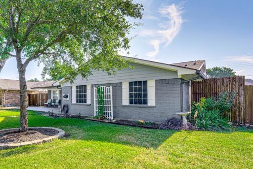 a house with a tree in a yard at Texas Home with Yard 2 Mi to Prairie Creek Park in Richardson