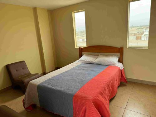 Ένα ή περισσότερα κρεβάτια σε δωμάτιο στο YOLO House Peru