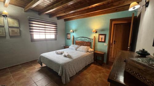 Postel nebo postele na pokoji v ubytování Casa Arteaga