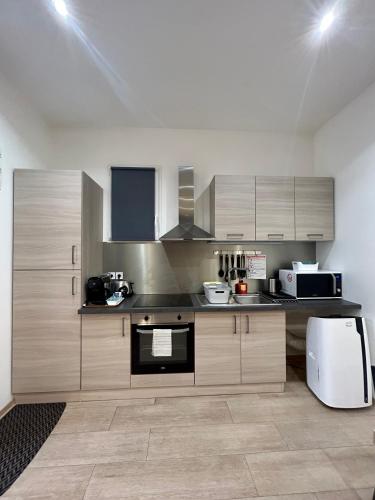 Η κουζίνα ή μικρή κουζίνα στο Aquitain Home chambre studio appartement Gare Saint Jean