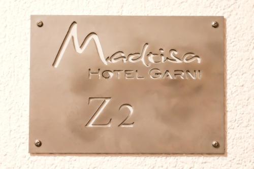 
The logo or sign for the condo hotel
