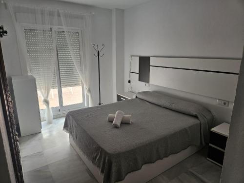 Postel nebo postele na pokoji v ubytování Precioso Apartamento en el centro, Parking Gratis