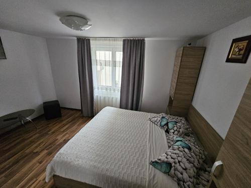 Ένα ή περισσότερα κρεβάτια σε δωμάτιο στο Casa Luca