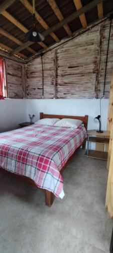 Postel nebo postele na pokoji v ubytování Cabañas Tres Soles