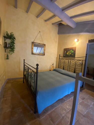 A bed or beds in a room at Maison Dina