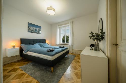 Postel nebo postele na pokoji v ubytování City Apartment with Rooftop Terrace