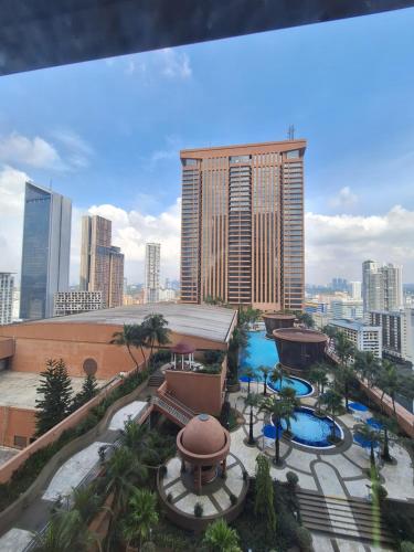 a view of a city skyline with a building at Best Apartment Suite At Times Square KL in Kuala Lumpur