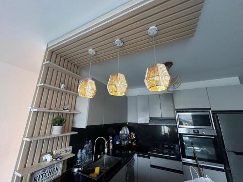Η κουζίνα ή μικρή κουζίνα στο Fouka bay 2 bd lagoon view
