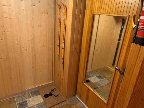 a bathroom with a shower and a mirror at Ski in & Ski out Apartment at Chalet Heinrich in Sonnenalpe Nassfeld