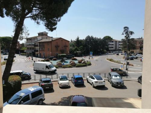 a bunch of cars parked in a parking lot at Angelana camere in Santa Maria degli Angeli