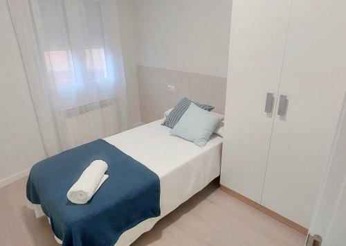 Katil atau katil-katil dalam bilik di Alcañiz Flats Center