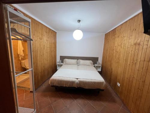 En eller flere senge i et værelse på Casa Alma