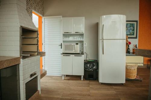 Dapur atau dapur kecil di Casa de Campo Tamanduá - Conexão com a Natureza!