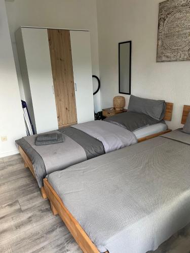 Katil atau katil-katil dalam bilik di FMA Ferienwohnung GD
