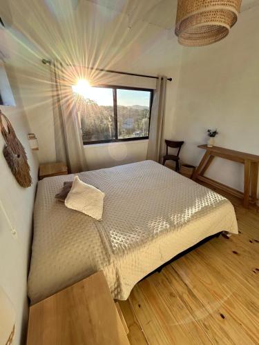 Voodi või voodid majutusasutuse Encalma Villa Serrana toas