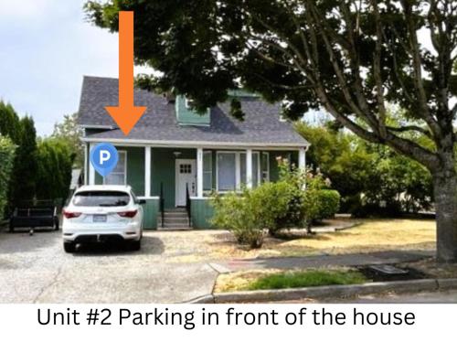a car parked in front of a house at DT Stylish & Newly Renovated Home 2BR Sea Tac 6 Miles with AC in Renton