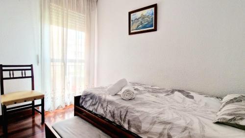 Katil atau katil-katil dalam bilik di Juan de Encina, playa o montaña