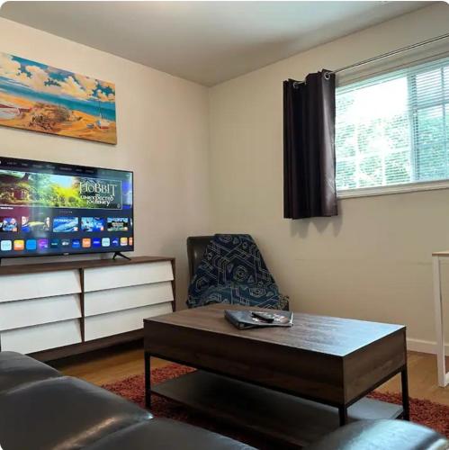 a living room with a couch and a coffee table at Nationwide Childrens Hospital close by in Columbus