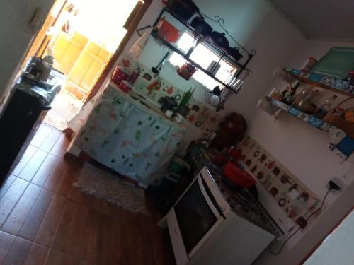 Η κουζίνα ή μικρή κουζίνα στο Hospedagem em Milho Verde