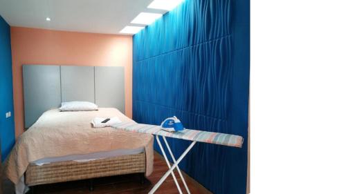 Postel nebo postele na pokoji v ubytování Apartamentos La Divina Misericordia