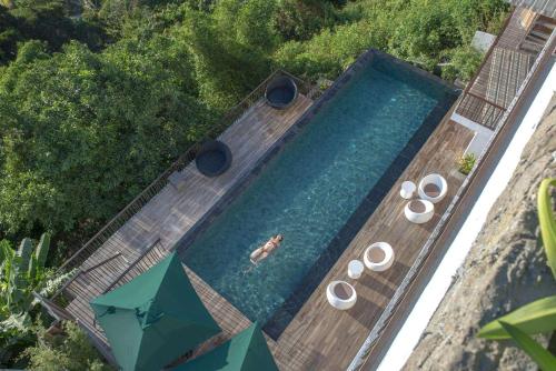 an overhead view of a person in a swimming pool at Narra Hill Tagaytay in Laurel