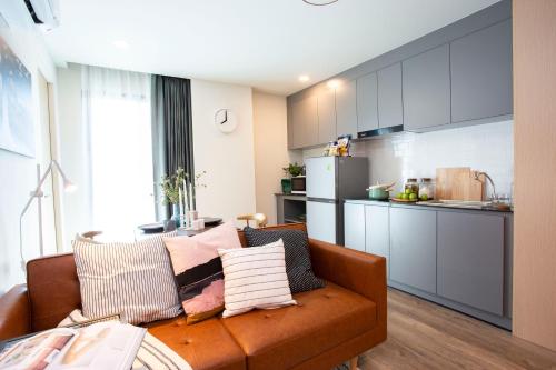 Kuchyň nebo kuchyňský kout v ubytování Parrish Serviced Apartment