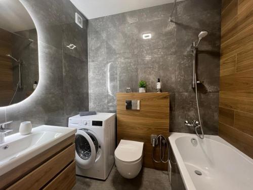 Ванная комната в Apartments VIP AVALON