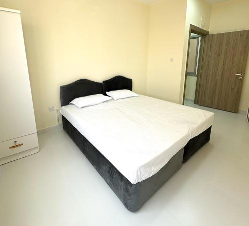 Postel nebo postele na pokoji v ubytování Baraha Star Residence