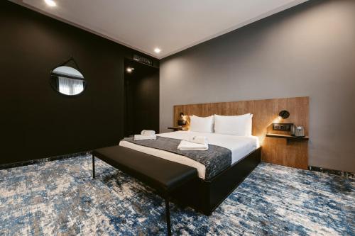 Postel nebo postele na pokoji v ubytování Hotel Splendid Tbilisi