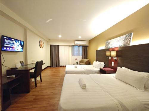 Katil atau katil-katil dalam bilik di Meetsuite at Ming Garden Residence