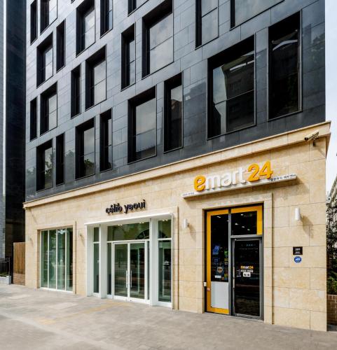 a building with the entrance to amt at Celib Yeoui in Seoul