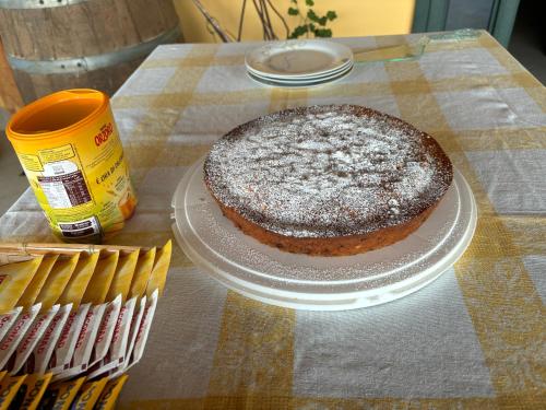 a chocolate cake on a plate on a table at B&B CASA MARTINA in Giungano