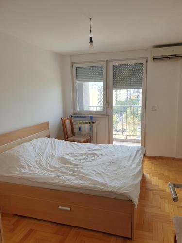 Llit o llits en una habitació de Marija's Apartment